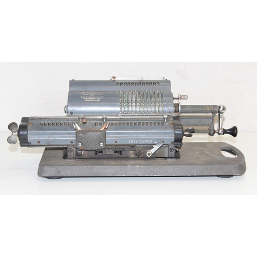 728 - A Guy's Britannic mechanical calculating machine no.22 on original base, serial no. 2BT/T12966, appr... 