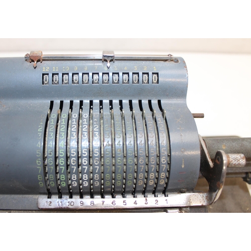 728 - A Guy's Britannic mechanical calculating machine no.22 on original base, serial no. 2BT/T12966, appr... 