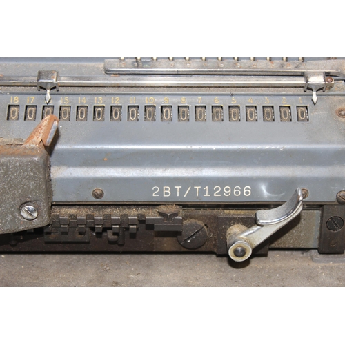 728 - A Guy's Britannic mechanical calculating machine no.22 on original base, serial no. 2BT/T12966, appr... 