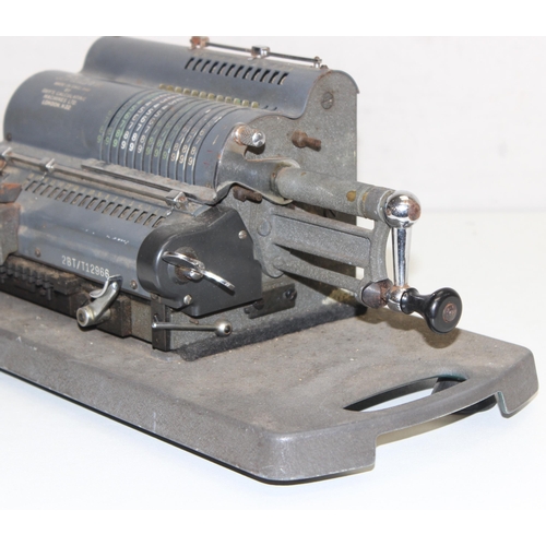 728 - A Guy's Britannic mechanical calculating machine no.22 on original base, serial no. 2BT/T12966, appr... 