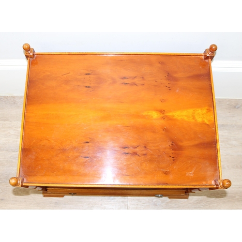 98 - A vintage good quality yew wood side table or bedside stand with low single drawer, approx 63cm wide... 