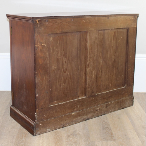 4 - Gillows of Lancaster, a vintage 2 door mahogany library cabinet or bookcase, the top of one door sta... 