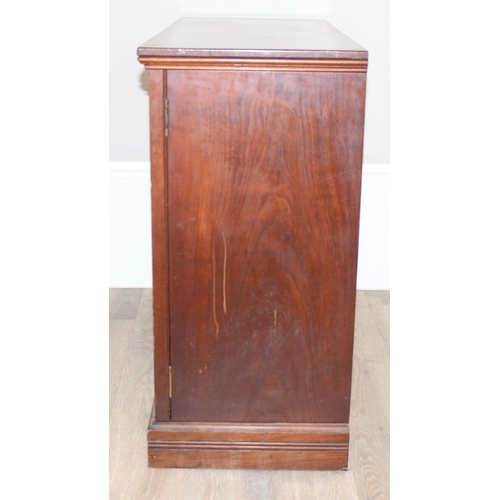 4 - Gillows of Lancaster, a vintage 2 door mahogany library cabinet or bookcase, the top of one door sta... 