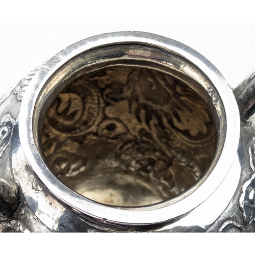 1123 - An impressive Chinese export silver sugar bowl with lid, embossed dragon design with a dragon head f... 