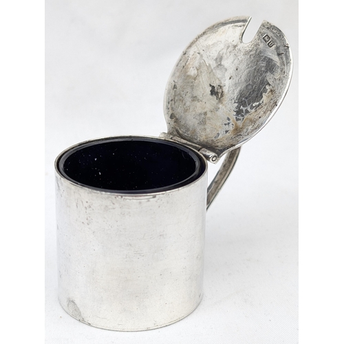 1127 - An antique silver mustard pot, Birmingham 1944 by J E Bushell, approx 45mm tall, approx 58.15g gross... 