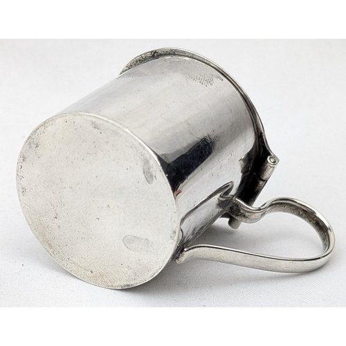 1127 - An antique silver mustard pot, Birmingham 1944 by J E Bushell, approx 45mm tall, approx 58.15g gross... 