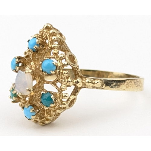 1150 - A retro 14ct gold ring set with turquoise and moonstone, indistinctly marked to reverse but XRF conf... 