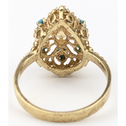 1150 - A retro 14ct gold ring set with turquoise and moonstone, indistinctly marked to reverse but XRF conf... 