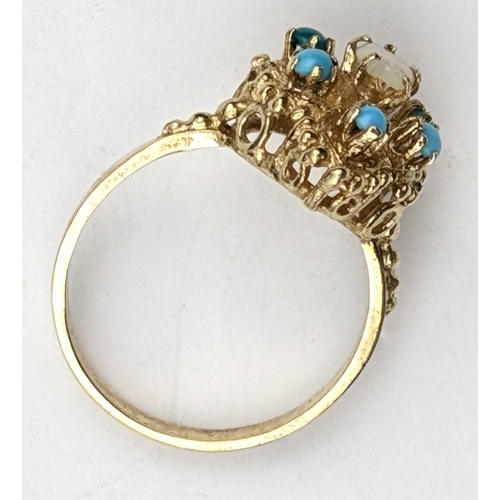 1150 - A retro 14ct gold ring set with turquoise and moonstone, indistinctly marked to reverse but XRF conf... 