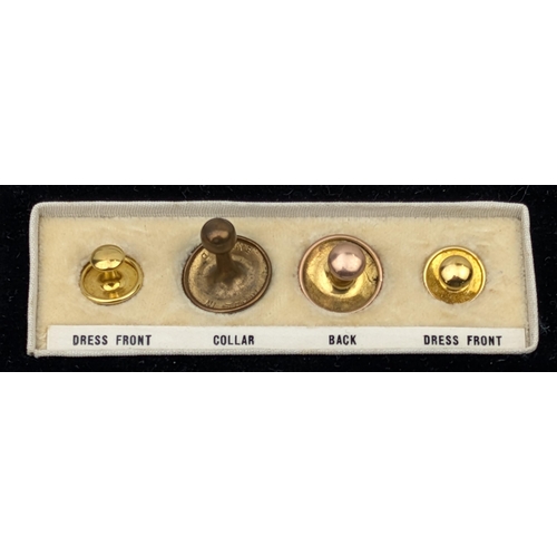 1152 - A boxed harlequin set of 4 shirt studs, 3 9ct gold both marked and XRF confirmed, and one gold plate... 