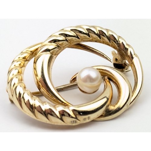 1155 - A retro 9ct gold brooch set with a pearl by Mappin & Webb, import marks for London 1981 and XRF conf... 