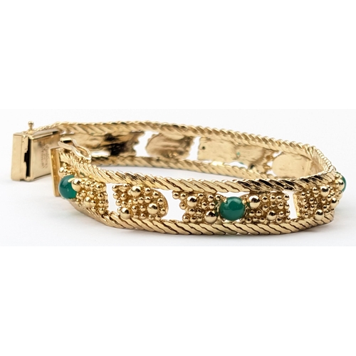 1159 - A retro Grosse of Germany gold plated bracelet with green cabochon stones, marked and dated 1966, ap... 