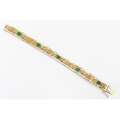 1159 - A retro Grosse of Germany gold plated bracelet with green cabochon stones, marked and dated 1966, ap... 