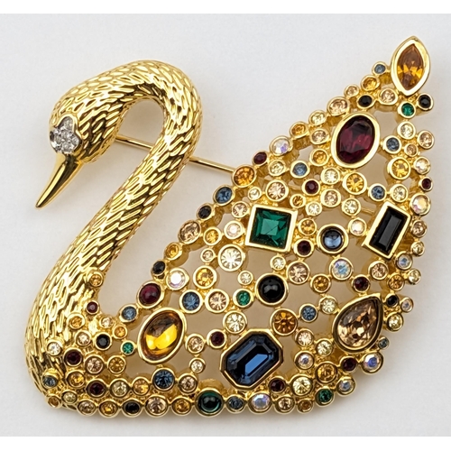 1160 - A vintage gold plated Swarovski brooch formed as a swan, set with jewels, boxed