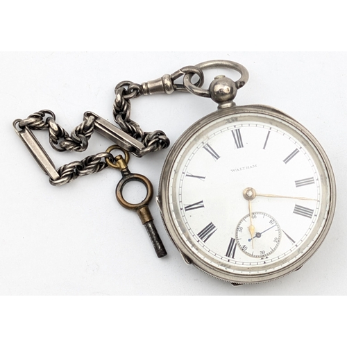 1366 - 2 silver cased pocket watches, one by Waltham with partial silver Albert chain, case marked for Birm... 