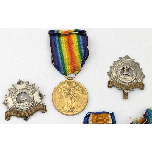 1437 - A WW1 family group of medals to inc a trio to 15401 Private A. Miles of Bedfordshire Regiment, with ... 