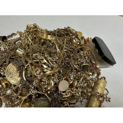 1165 - A huge qty of assorted vintage gold plated jewellery, approx 2kg gross