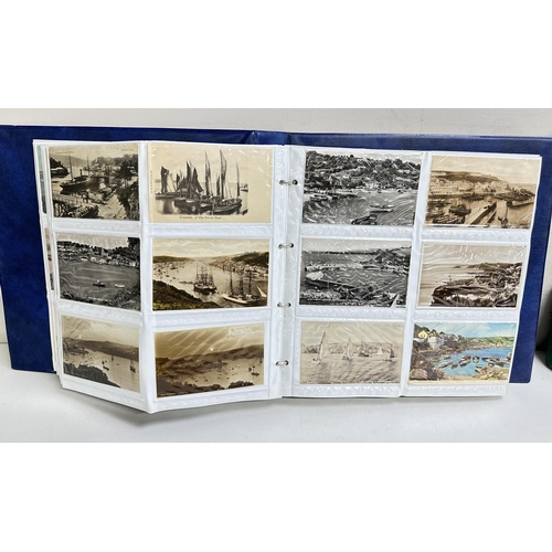 545 - 2 postcard albums and contents, mainly British seaside and Northern European scenes