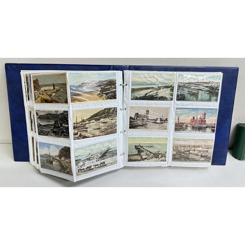 545 - 2 postcard albums and contents, mainly British seaside and Northern European scenes