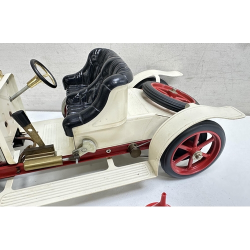 615 - A vintage Mamod steam car, roadster model, no box but with steering rod, approx 42cm long