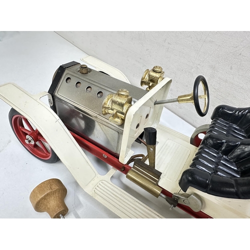 615 - A vintage Mamod steam car, roadster model, no box but with steering rod, approx 42cm long