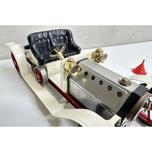 615 - A vintage Mamod steam car, roadster model, no box but with steering rod, approx 42cm long