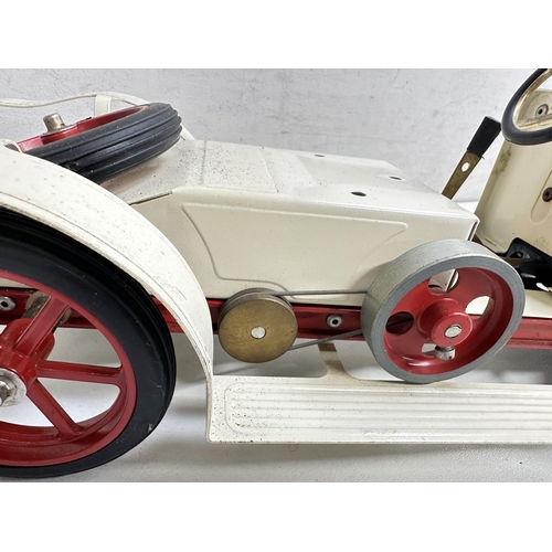 615 - A vintage Mamod steam car, roadster model, no box but with steering rod, approx 42cm long