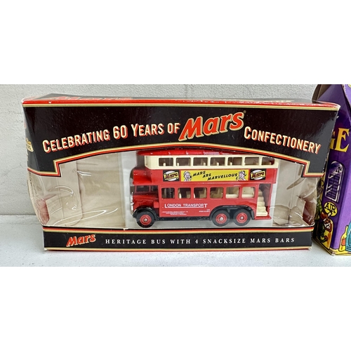 620 - Qty of boxed toy vehicles to include chocolate advertising including Cadbury's, some with products