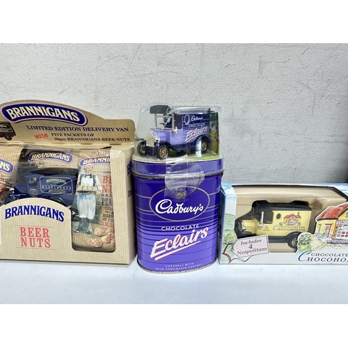 620 - Qty of boxed toy vehicles to include chocolate advertising including Cadbury's, some with products