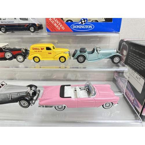 623 - A qty of toy vehicles to include a boxed MRC Elvis pink Cadillac and a qty of other unboxed vehicles... 