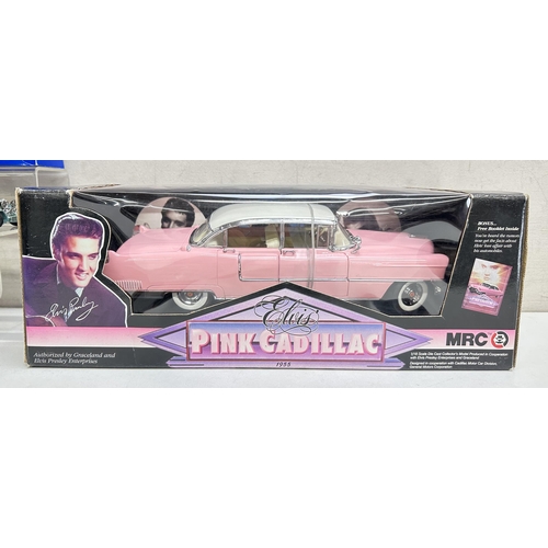 623 - A qty of toy vehicles to include a boxed MRC Elvis pink Cadillac and a qty of other unboxed vehicles... 