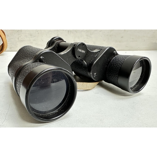 729 - A pair of Hartmann Wetzlar 117 Porlerim 9x40 binoculars in original leather case