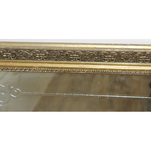 352 - A very large vintage mirror emblazoned with 