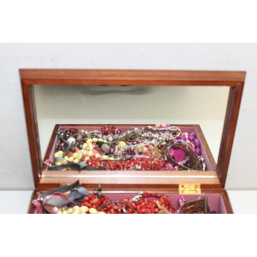 1182 - 2 vintage jewellery boxes containing a large qty of assorted costume jewellery