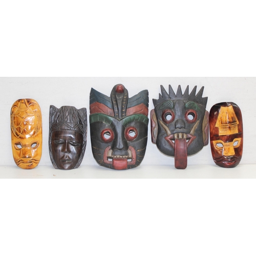 1682 - 5 assorted ethnic carved wooden masks, the largest approx 28cm tall