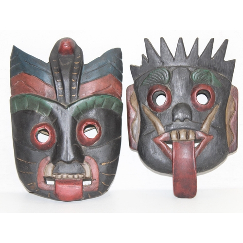 1682 - 5 assorted ethnic carved wooden masks, the largest approx 28cm tall