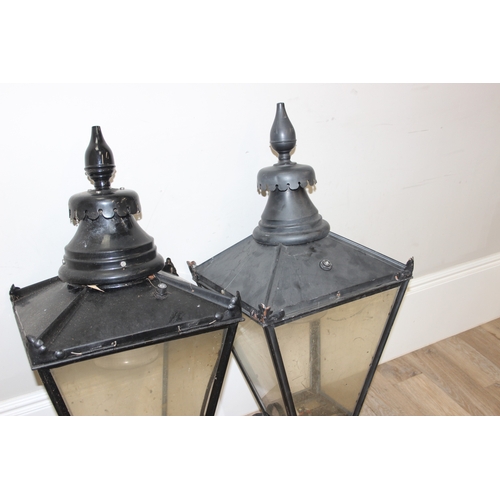 251 - A pair of Victorian style black painted copper street lamp or lantern tops, likely 20th century with... 