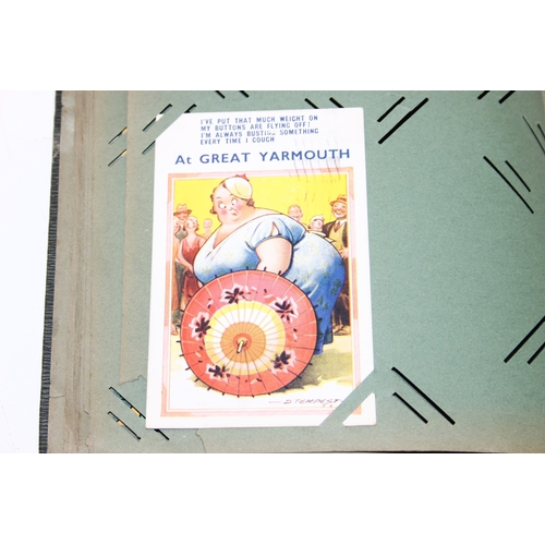 576 - An antique postcard album and contents to inc many early 20th century humorous cards