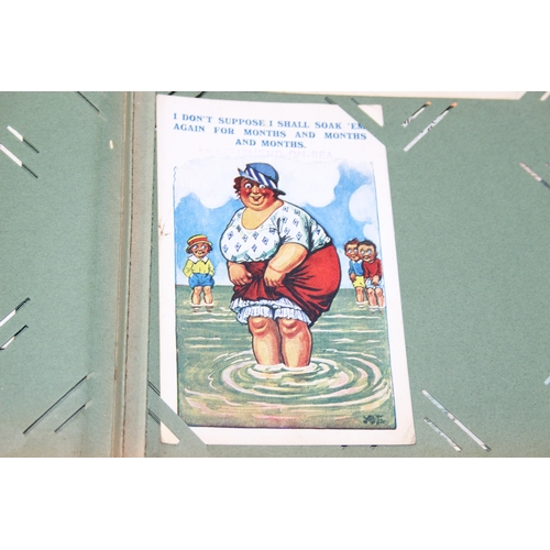 576 - An antique postcard album and contents to inc many early 20th century humorous cards