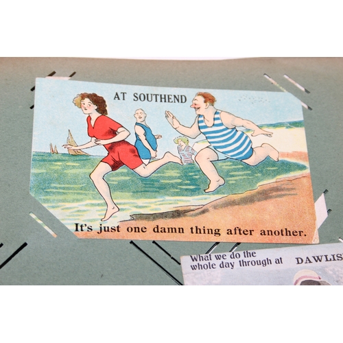 576 - An antique postcard album and contents to inc many early 20th century humorous cards