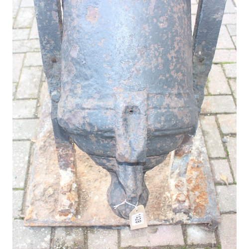 1428 - An antique cast iron cannon on later iron base, seemingly without marks but believed to be 18th/19th... 