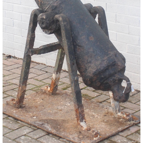 1428 - An antique cast iron cannon on later iron base, seemingly without marks but believed to be 18th/19th... 