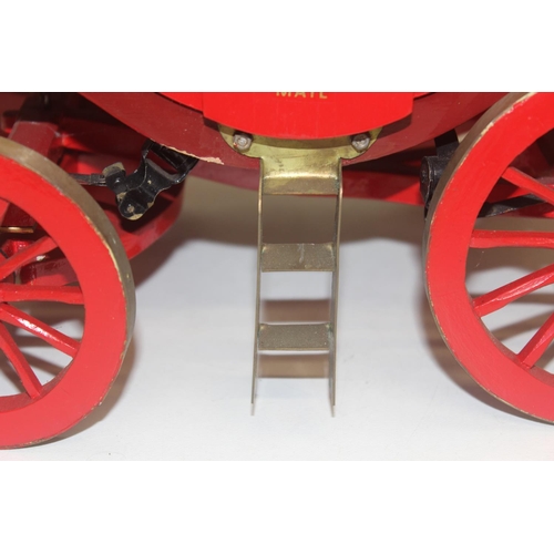 1541 - A superb quality vintage scratch built wooden model of a Victorian Royal Mail carriage or coach, wit... 