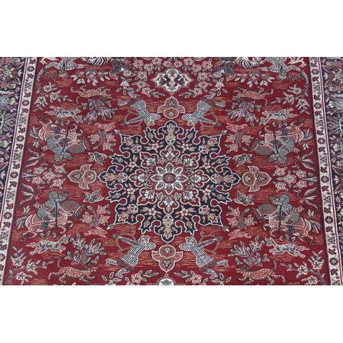 213 - A vintage red ground Turkish Hali made Shiraz designed rug with hand finished details, fine quality,... 