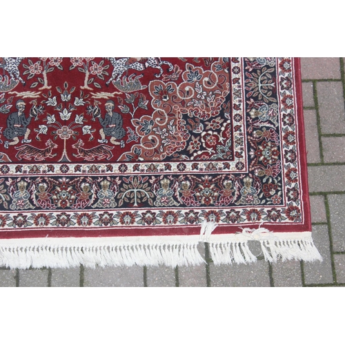 213 - A vintage red ground Turkish Hali made Shiraz designed rug with hand finished details, fine quality,... 