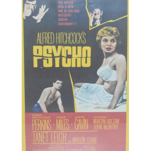 417 - 2 vintage style film posters to inc The Goonies & Psycho, both framed, the largest approx 43cm x 35c... 