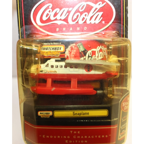 616 - 4 Coca-Cola advertising scale model vehicles in original packaging