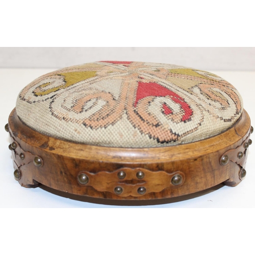 14 - A Victorian tapestry topped footstool of Gothic revival style, approx 28cm in diameter