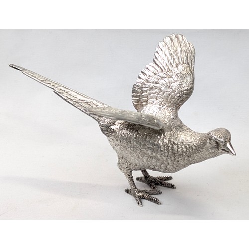 1024 - A pair of superb quality cast silver pheasants by Asprey & Garrard, each marked for London 2000 by A... 