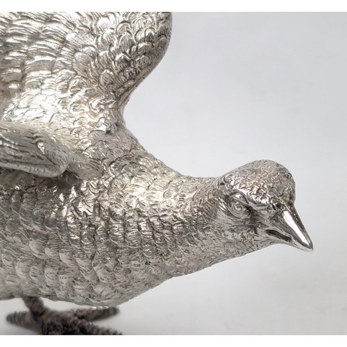 1024 - A pair of superb quality cast silver pheasants by Asprey & Garrard, each marked for London 2000 by A... 